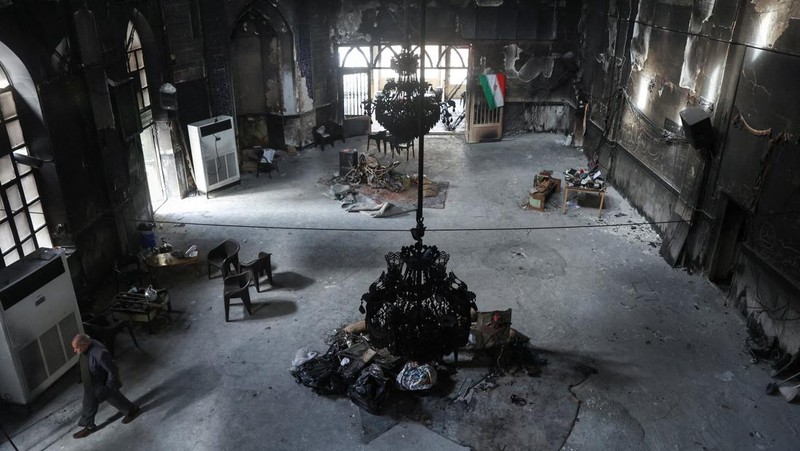 Bus-bus yang dibakar selama protes di Iran, di Teheran, Iran, 21 Januari 2026. (Majid Asgaripour/WANA (West Asia News Agency) via REUTERS)