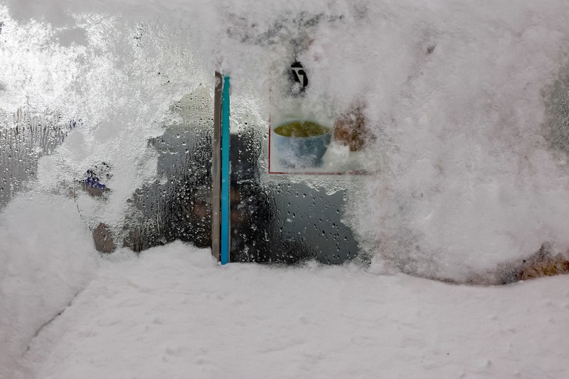 Penampakan salju tebal selimuti sebagian besar wilayah AS, Minggu (25/1/2026). (REUTERS/Jeenah Moon)