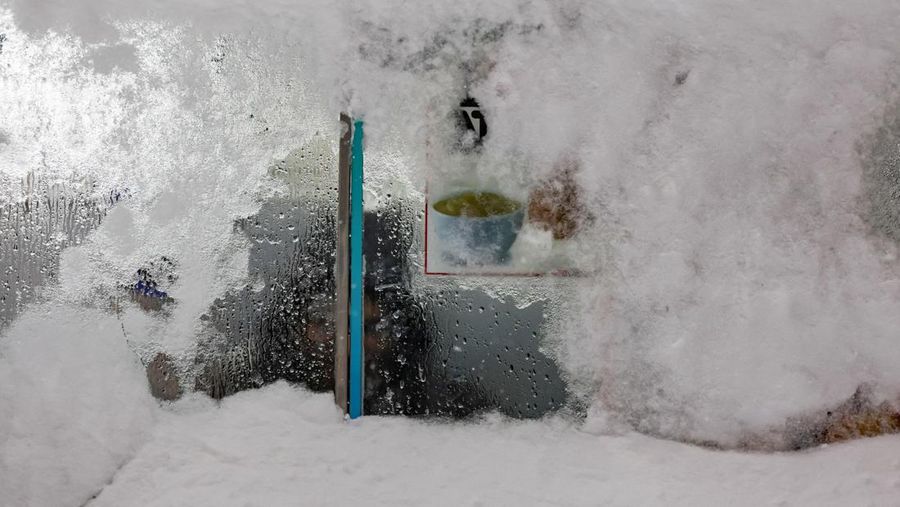 Penampakan salju tebal selimuti sebagian besar wilayah AS, Minggu (25/1/2026). (REUTERS/Jeenah Moon)