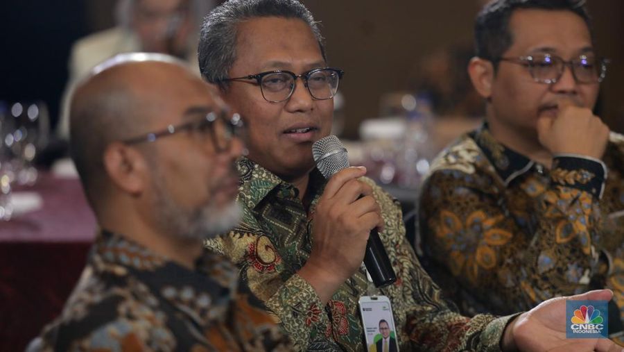 Direktur Utama PT Pegadaian, Damar Latri Setiawan menyampaikan paparan dalam acara Gold Outlook 2026 di Menara Bank Mega, Jakarta, Jumat (30/1/2026). (CNBC Indonesia/Muhammad Sabki)