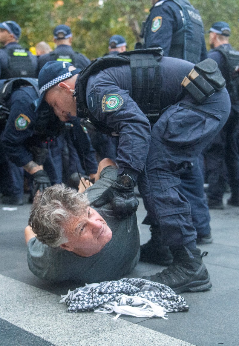 Demonstrators gather at Town Hall Square to protest against Israeli President Isaac Herzog's state visit to Australia following a deadly mass shooting during a Jewish Hanukkah celebration at Bondi Beach on December 14, 2025, in Sydney, Australia, February 9, 2026. REUTERS/Jeremy Piper &lrm;
