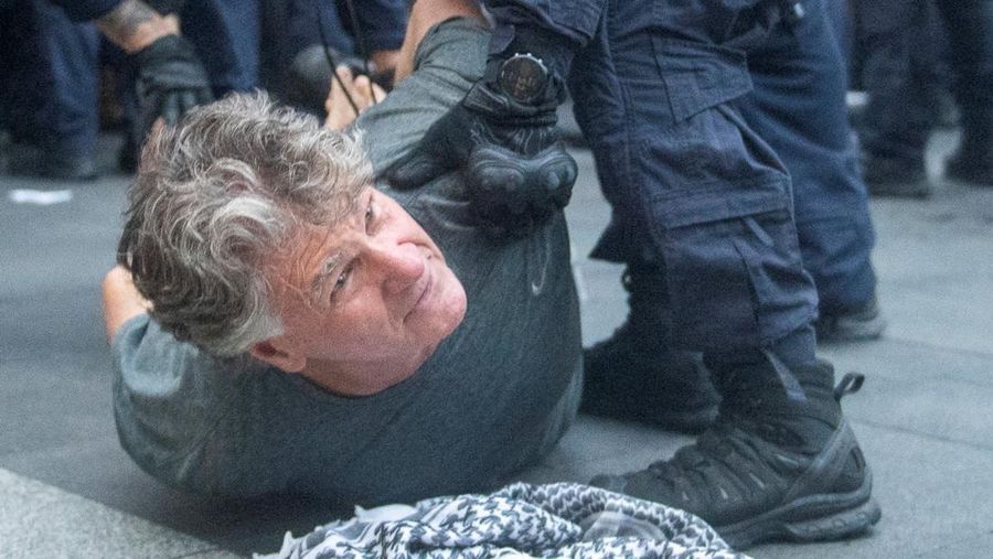 Demonstrators gather at Town Hall Square to protest against Israeli President Isaac Herzog's state visit to Australia following a deadly mass shooting during a Jewish Hanukkah celebration at Bondi Beach on December 14, 2025, in Sydney, Australia, February 9, 2026. REUTERS/Jeremy Piper &lrm;