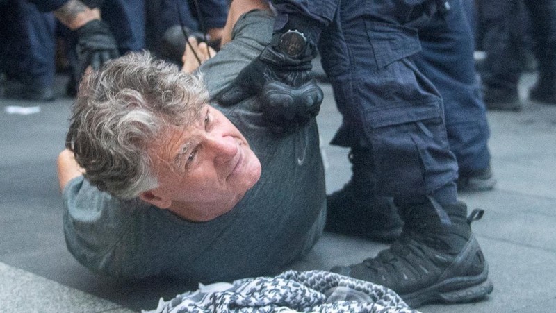 Demonstrators gather at Town Hall Square to protest against Israeli President Isaac Herzog's state visit to Australia following a deadly mass shooting during a Jewish Hanukkah celebration at Bondi Beach on December 14, 2025, in Sydney, Australia, February 9, 2026. REUTERS/Jeremy Piper &lrm;