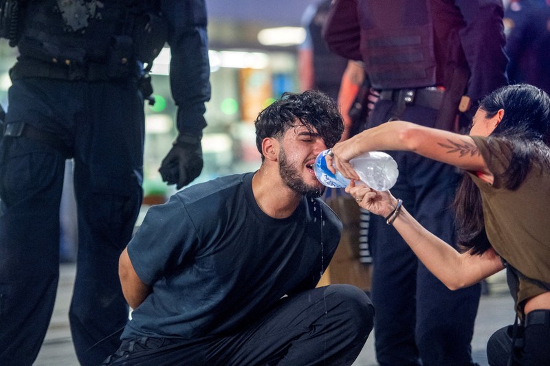 Demonstrators gather at Town Hall Square to protest against Israeli President Isaac Herzog's state visit to Australia following a deadly mass shooting during a Jewish Hanukkah celebration at Bondi Beach on December 14, 2025, in Sydney, Australia, February 9, 2026. REUTERS/Jeremy Piper &lrm;