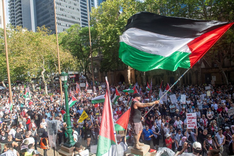 Demonstrators gather at Town Hall Square to protest against Israeli President Isaac Herzog's state visit to Australia following a deadly mass shooting during a Jewish Hanukkah celebration at Bondi Beach on December 14, 2025, in Sydney, Australia, February 9, 2026. REUTERS/Jeremy Piper &lrm;