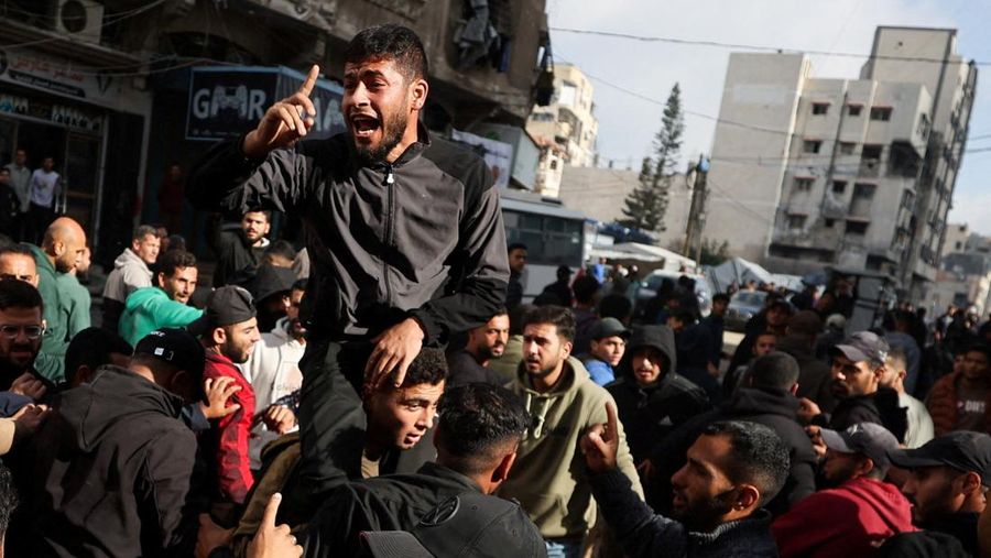 SENSITIVE MATERIAL. THIS IMAGE MAY OFFEND OR DISTURB    Mourners carry the bodies of Palestinians, who, according to medics, were killed by an Israeli strike on Monday, during their funeral, in Gaza City, February 10, 2026. REUTERS/Dawoud Abu Alkas
