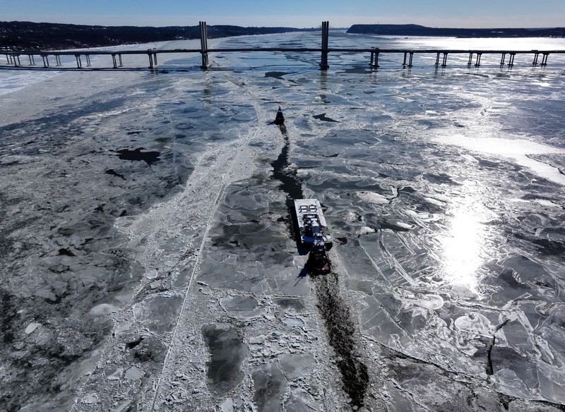 NEW YORK, NEW YORK - FEBRUARY 09: Ice floes cover part of the Hudson River along the Manhattan shoreline as New York City continues to experience frigid temperatures on February 9, 2026, in New York City. Some ferry services have been cancelled, and the remaining boats have had to add up to 20 minutes on routes to and from New Jersey to navigate the ice.   Spencer Platt/Getty Images/AFP (Photo by SPENCER PLATT / GETTY IMAGES NORTH AMERICA / Getty Images via AFP)