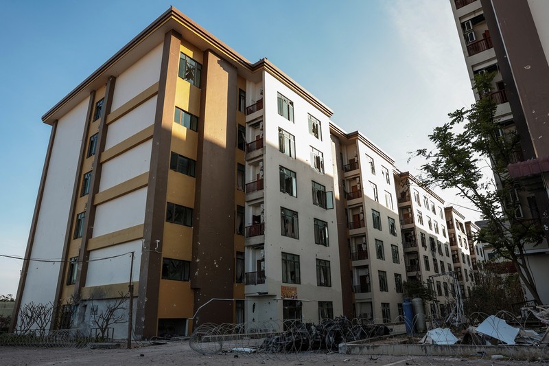 Scam compounds in O'Smach used for scam operations, behind wire fencing at the Chong Chom-O'Smach border crossing, which was bombed and occupied by the Thai military in December following clashes between Thailand and Cambodia along a disputed border area, in Samraong, Oddar Meanchey province, Cambodia, February 2, 2026. REUTERS/Chalinee Thirasupa