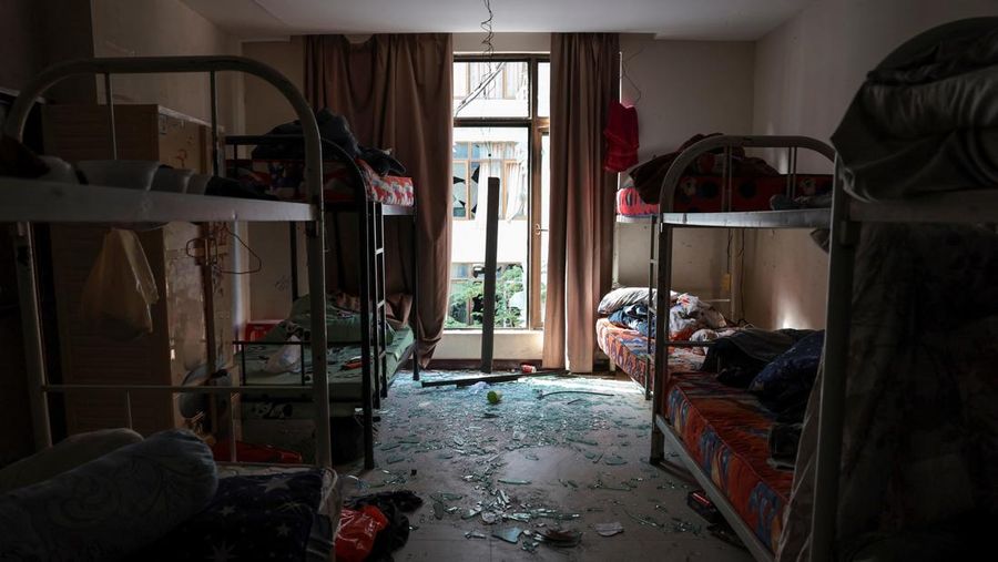 Scam compounds in O'Smach used for scam operations, behind wire fencing at the Chong Chom-O'Smach border crossing, which was bombed and occupied by the Thai military in December following clashes between Thailand and Cambodia along a disputed border area, in Samraong, Oddar Meanchey province, Cambodia, February 2, 2026. REUTERS/Chalinee Thirasupa