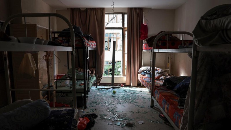 Scam compounds in O'Smach used for scam operations, behind wire fencing at the Chong Chom-O'Smach border crossing, which was bombed and occupied by the Thai military in December following clashes between Thailand and Cambodia along a disputed border area, in Samraong, Oddar Meanchey province, Cambodia, February 2, 2026. REUTERS/Chalinee Thirasupa