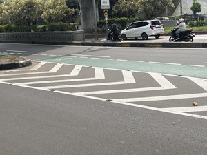 Kondisi Terkini Jalan di Cawang Usai Mata Kucing Dibongkar Sosok Bertopeng