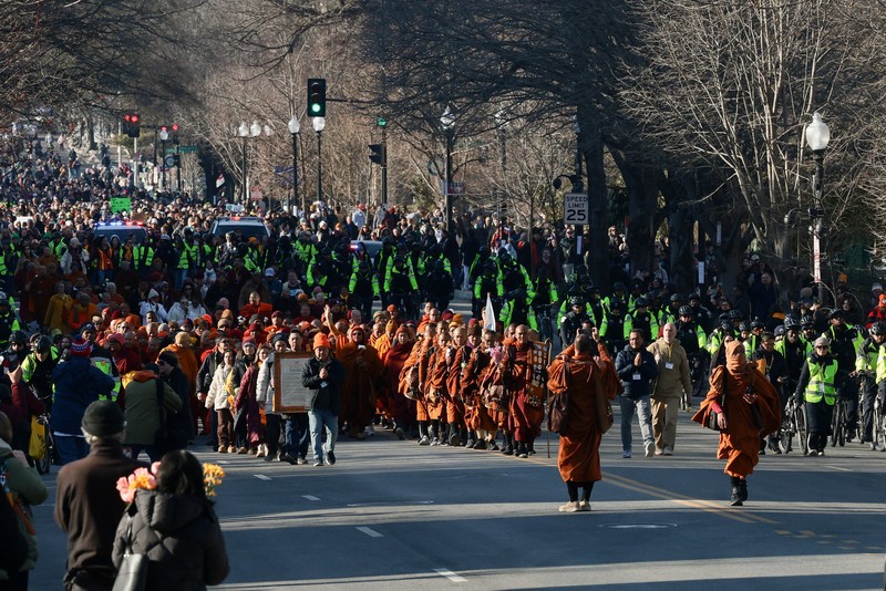 A group of Buddhist monks on the 2,300 mile &ldquo;Walk for Peace&rdquo; walk along Massachusetts Avenue at Embassy Row, in Washington, D.C., U.S, February 10, 2026. REUTERS/Evelyn Hockstein     TPX IMAGES OF THE DAY