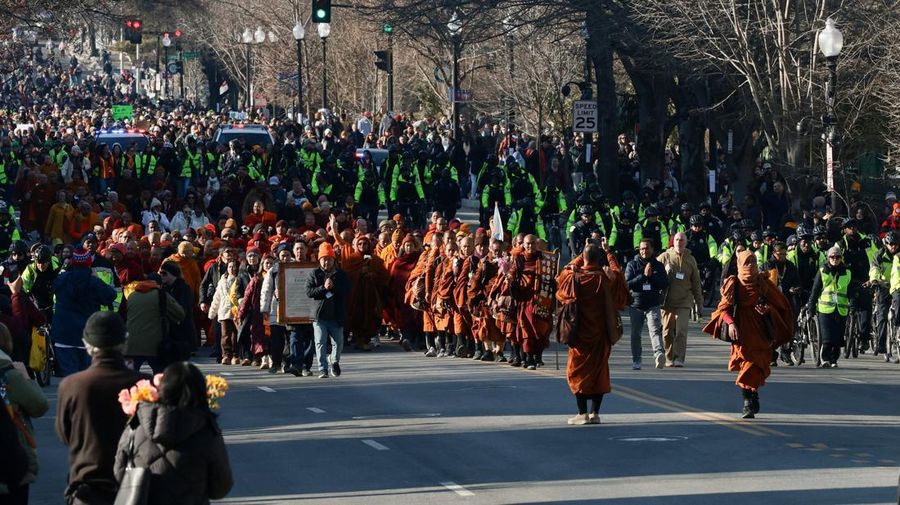 A group of Buddhist monks on the 2,300 mile &ldquo;Walk for Peace&rdquo; walk along Massachusetts Avenue at Embassy Row, in Washington, D.C., U.S, February 10, 2026. REUTERS/Evelyn Hockstein     TPX IMAGES OF THE DAY