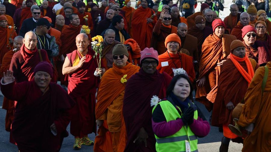 A group of Buddhist monks on the 2,300 mile &ldquo;Walk for Peace&rdquo; walk along Massachusetts Avenue at Embassy Row, in Washington, D.C., U.S, February 10, 2026. REUTERS/Evelyn Hockstein     TPX IMAGES OF THE DAY