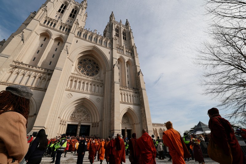 A group of Buddhist monks on the 2,300 mile &ldquo;Walk for Peace&rdquo; walk along Massachusetts Avenue at Embassy Row, in Washington, D.C., U.S, February 10, 2026. REUTERS/Evelyn Hockstein     TPX IMAGES OF THE DAY