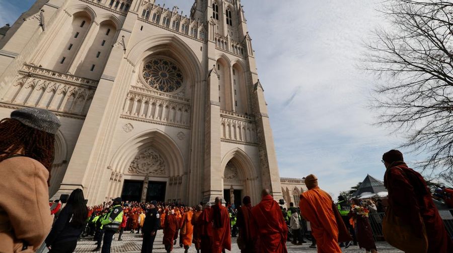 A group of Buddhist monks on the 2,300 mile &ldquo;Walk for Peace&rdquo; walk along Massachusetts Avenue at Embassy Row, in Washington, D.C., U.S, February 10, 2026. REUTERS/Evelyn Hockstein     TPX IMAGES OF THE DAY