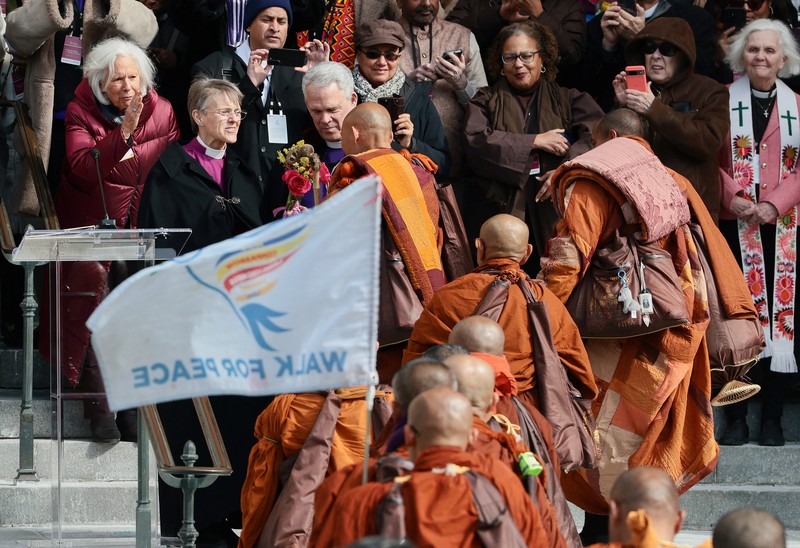 A group of Buddhist monks on the 2,300 mile &ldquo;Walk for Peace&rdquo; walk along Massachusetts Avenue at Embassy Row, in Washington, D.C., U.S, February 10, 2026. REUTERS/Evelyn Hockstein     TPX IMAGES OF THE DAY