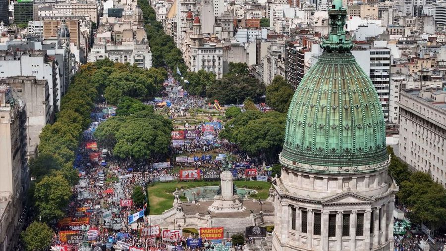 A drone view shows riot police clashing with union members protesting outside the National Congress as members of Argentina's Senate discuss labour reforms proposed by President Javier Milei's libertarian government to attract investment and revive growth, while labour groups say it would roll back workers' rights, in Buenos Aires, Argentina, February 11, 2026. REUTERS/Martin Cossarini