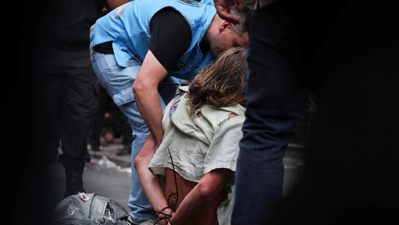 A drone view shows riot police clashing with union members protesting outside the National Congress as members of Argentina's Senate discuss labour reforms proposed by President Javier Milei's libertarian government to attract investment and revive growth, while labour groups say it would roll back workers' rights, in Buenos Aires, Argentina, February 11, 2026. REUTERS/Martin Cossarini