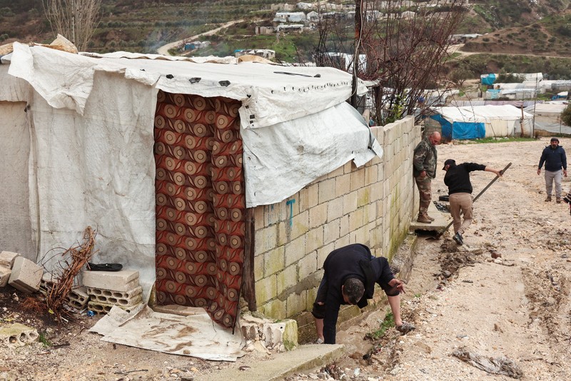Sebuah tayangan drone menunjukkan kamp-kamp setelah dilanda banjir akibat hujan lebat di pedesaan Idlib, Suriah, 12 Februari 2026. (REUTERS/Mahmoud Hassano)