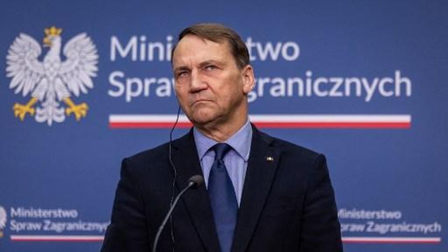 Poland's Foreign Affairs Minister Radoslaw Sikorski and Saudi Arabia's Foreign Affairs Minister (not in picture) give a joint press conference after their meeting at the Foreign Office in Warsaw, January 26, 2026. (Photo by Wojtek RADWANSKI / AFP)