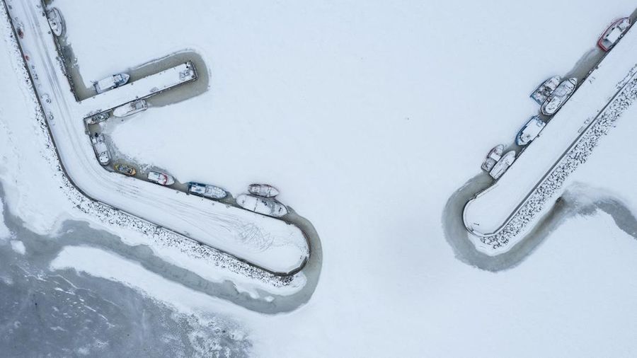 A drone view of the frozen Puck Bay and the harbour in Jastarnia, Poland, February 14, 2026. REUTERS/Lukasz Glowala