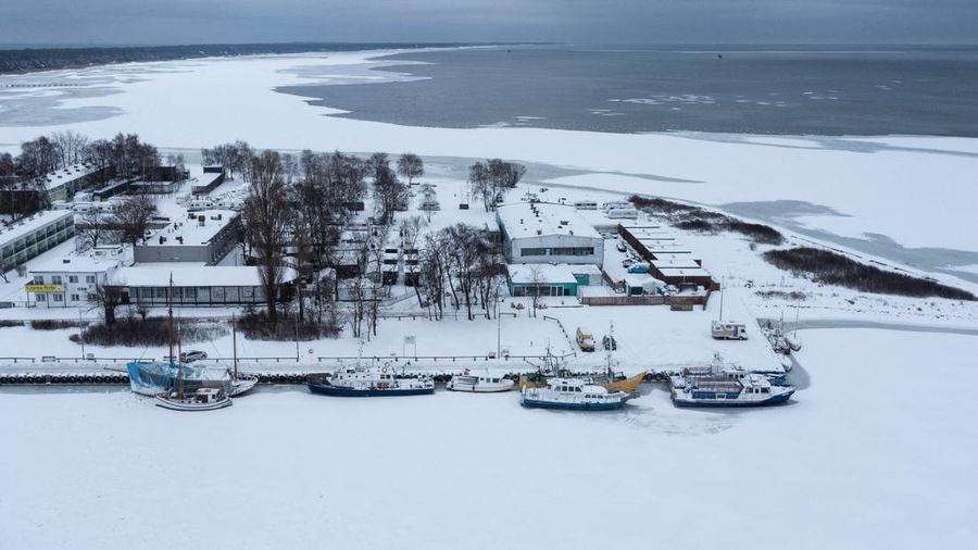 A drone view of the frozen Puck Bay and the harbour in Jastarnia, Poland, February 14, 2026. REUTERS/Lukasz Glowala