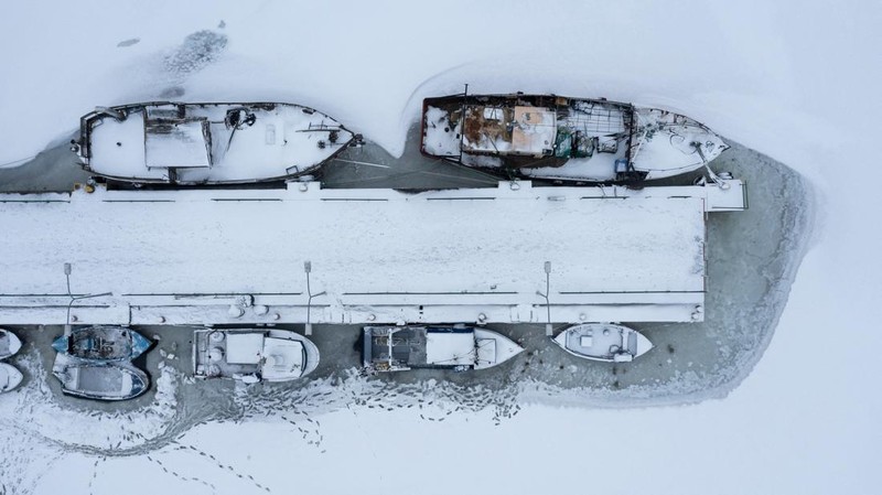 A drone view of the frozen Puck Bay and the harbour in Jastarnia, Poland, February 14, 2026. REUTERS/Lukasz Glowala