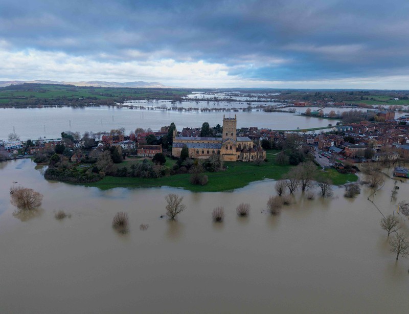 A drone view shows floodwater from the rivers Avon and Severn surrounding Tewkesbury Abbey following a long period of rain in Tewkesbury, Britain, February 16, 2026 REUTERS/Phil Noble