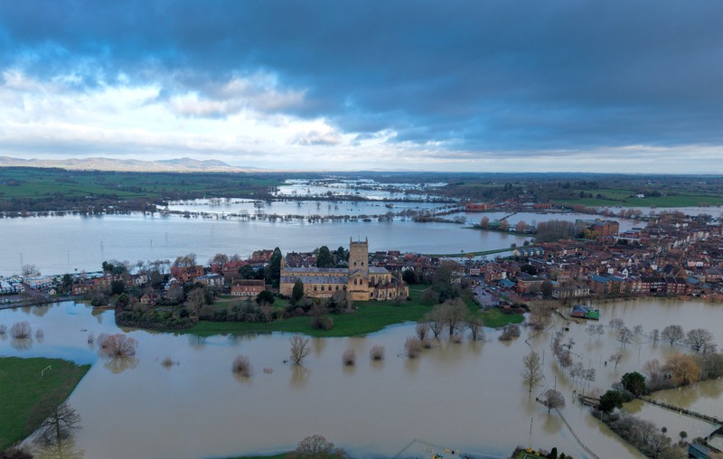 A drone view shows floodwater from the rivers Avon and Severn surrounding Tewkesbury Abbey following a long period of rain in Tewkesbury, Britain, February 16, 2026 REUTERS/Phil Noble