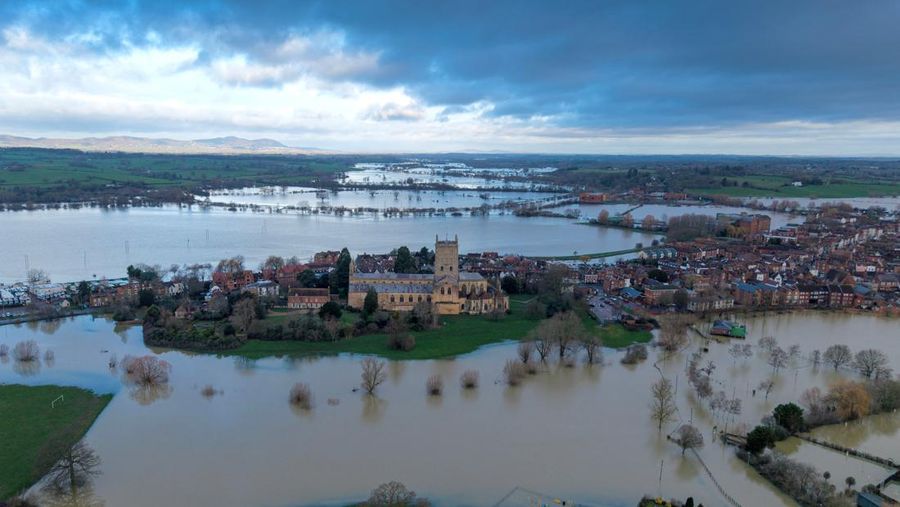 A drone view shows floodwater from the rivers Avon and Severn surrounding Tewkesbury Abbey following a long period of rain in Tewkesbury, Britain, February 16, 2026 REUTERS/Phil Noble