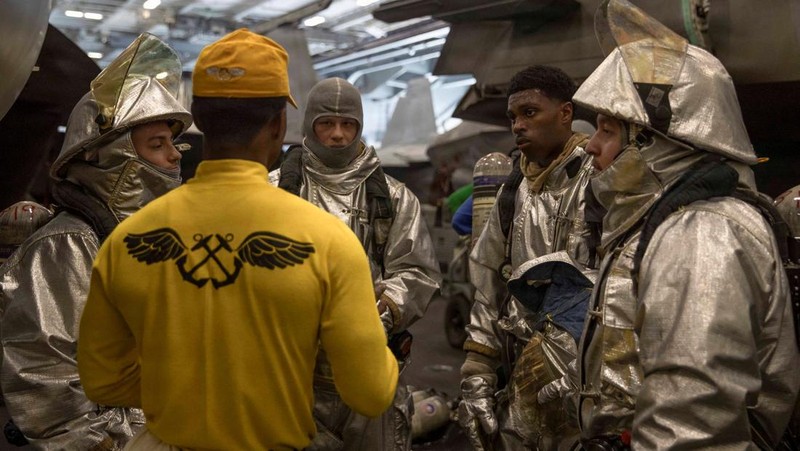 The U.S. Navy's Nimitz-class aircraft carrier USS Abraham Lincoln, Arleigh Burke-class guided-missile destroyer USS Frank E. Petersen Jr. and Lewis and Clark-class dry cargo ship USNS Carl Brashear sail during a photo exercise in the Arabian Sea, February 6, 2026.  U.S. Navy/Mass Communication Specialist 1st Class Jesse Monford/Handout via REUTERS THIS IMAGE HAS BEEN SUPPLIED BY A THIRD PARTY
