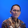 Kepala Eksekutif Pengawas Perasuransian, Penjaminan, dan Dana Pensiun Otoritas Jasa Keuangan (OJK), Ogi Prastomiyono menyampaikan pemaparan dalam acara Insurance Forum 2026 di Jakarta, Jumat (20/2/2026). (CNBC Indonesia/Faisal Rahman)