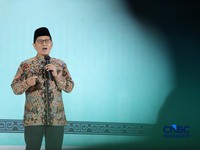 Ketua Dewan Syariah Nasional Majelis Ulama Indonesia, K.H. Muhammad Cholil Nafis saat menyampaikan tausiah dalam Sarasehan 99 Ekonom Syariah: Sharia Investment Forum 2026 di Jakarta, Selasa (24/2/2026).(CNBC Indonesia/Tri Susilo)