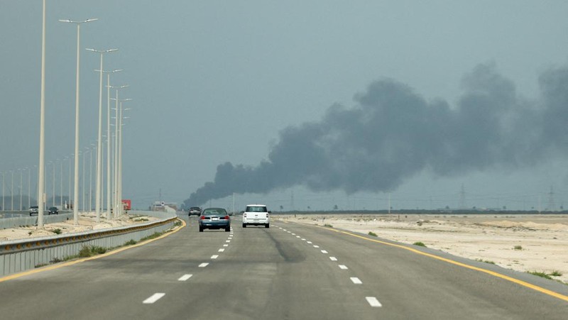 Workers evacuate area around Saudi Aramco's Ras Tanura oil refinery as smoke rises following a reported Iranian drone strike, in Ras Tanura, Saudi Arabia, in this still image obtained from social media video released on March 2, 2026. Social Media/via REUTERS  THIS IMAGE HAS BEEN SUPPLIED BY A THIRD PARTY. NO RESALES. NO ARCHIVES. NEWS USE ONLY. VERIFICATION: Reuters verified the location from the buildings, trees and the smoke stacks seen in the video, which matched satellite imagery of the area. The date was verified from an official statement from Aramco saying it had shut the facility down after a drone strike on March 2. No older versions of the videos were found posted online before March 2. Coordinates: 26.70322602981727, 50.090750650948635.
