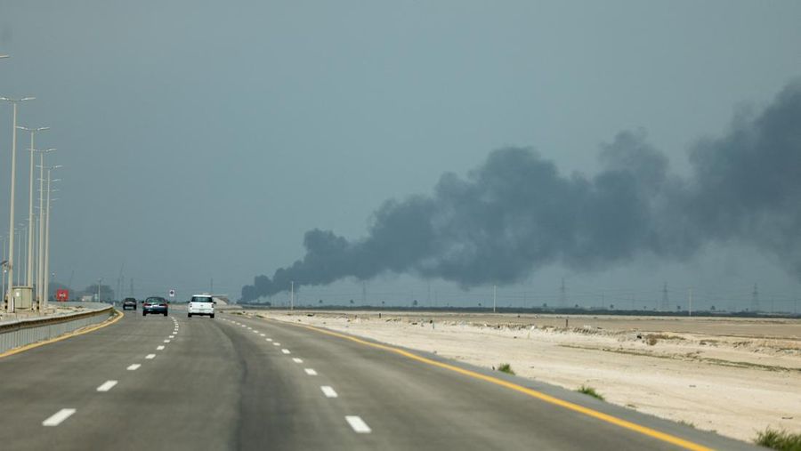 Workers evacuate area around Saudi Aramco's Ras Tanura oil refinery as smoke rises following a reported Iranian drone strike, in Ras Tanura, Saudi Arabia, in this still image obtained from social media video released on March 2, 2026. Social Media/via REUTERS  THIS IMAGE HAS BEEN SUPPLIED BY A THIRD PARTY. NO RESALES. NO ARCHIVES. NEWS USE ONLY. VERIFICATION: Reuters verified the location from the buildings, trees and the smoke stacks seen in the video, which matched satellite imagery of the area. The date was verified from an official statement from Aramco saying it had shut the facility down after a drone strike on March 2. No older versions of the videos were found posted online before March 2. Coordinates: 26.70322602981727, 50.090750650948635.