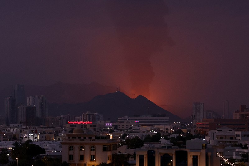 Smoke rises in the Fujairah oil industry zone following a fire caused by debris after interception of a drone by air defenses, according to the Fujairah media office, amid the U.S.-Israel conflict with Iran, in Fujairah, United Arab Emirates, March 3, 2026. REUTERS/Amr Alfiky