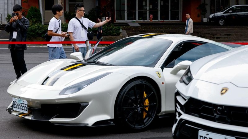Luxury cars are on display, as Taiwan auctions off luxury cars linked to the Cambodian scam centre Prince Group, in Taipei, Taiwan, March 2, 2026. REUTERS/Ann Wang