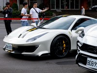 Luxury cars are on display, as Taiwan auctions off luxury cars linked to the Cambodian scam centre Prince Group, in Taipei, Taiwan, March 2, 2026. REUTERS/Ann Wang