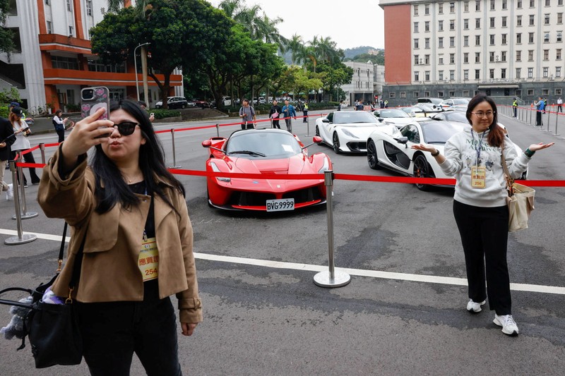 Luxury cars are on display, as Taiwan auctions off luxury cars linked to the Cambodian scam centre Prince Group, in Taipei, Taiwan, March 2, 2026. REUTERS/Ann Wang