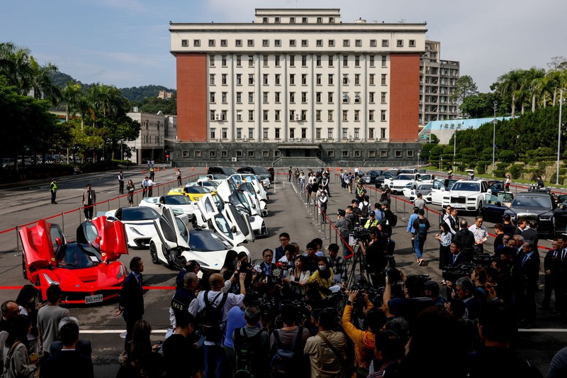 Luxury cars are on display, as Taiwan auctions off luxury cars linked to the Cambodian scam centre Prince Group, in Taipei, Taiwan, March 2, 2026. REUTERS/Ann Wang