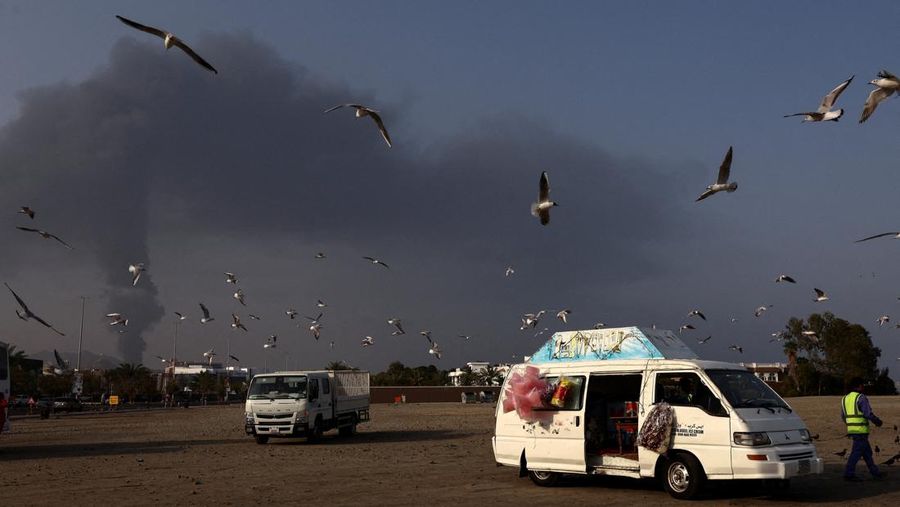Smoke rises in the Fujairah oil industry zone following a fire caused by debris after interception of a drone by air defenses, according to the Fujairah media office, amid the U.S.-Israel conflict with Iran, in Fujairah, United Arab Emirates, March 3, 2026. REUTERS/Amr Alfiky