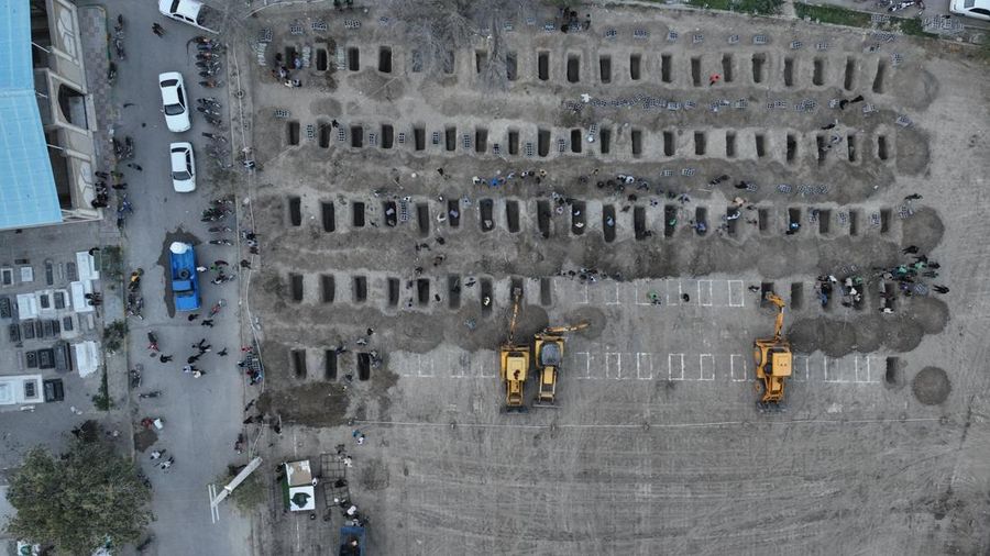 Graves are being prepared for the victims following an Israeli strike on a school in Minab, Iran, March 2, 2026. Iranian Foreign Media Department/WANA (West Asia News Agency)/Handout via REUTERS ATTENTION EDITORS - THIS PICTURE WAS PROVIDED BY A THIRD PARTY.
