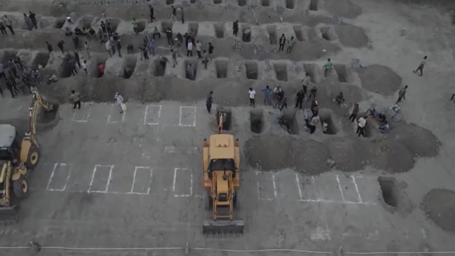 Graves are being prepared for the victims following an Israeli strike on a school in Minab, Iran, March 2, 2026. Iranian Foreign Media Department/WANA (West Asia News Agency)/Handout via REUTERS ATTENTION EDITORS - THIS PICTURE WAS PROVIDED BY A THIRD PARTY.