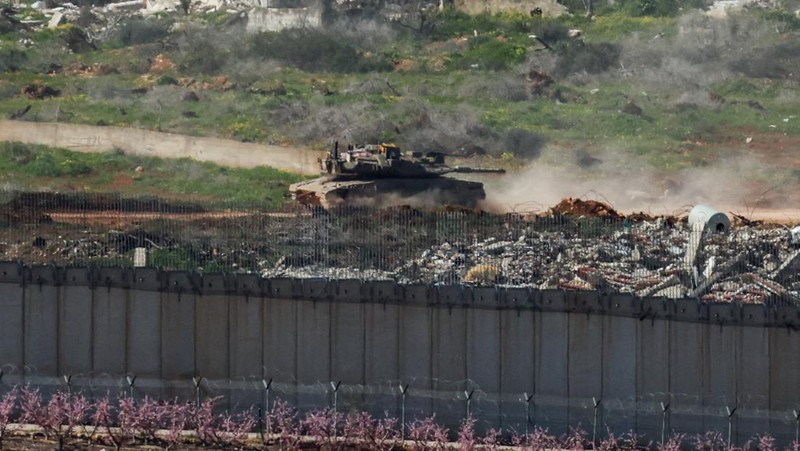 An Israeli tank manouvers in Lebanon, following an escalation between Hezbollah and Israel amid the U.S.-Israeli conflict with Iran, as seen from the Israeli side of the border with Lebanon, March 5, 2026. REUTERS/Ammar Awad