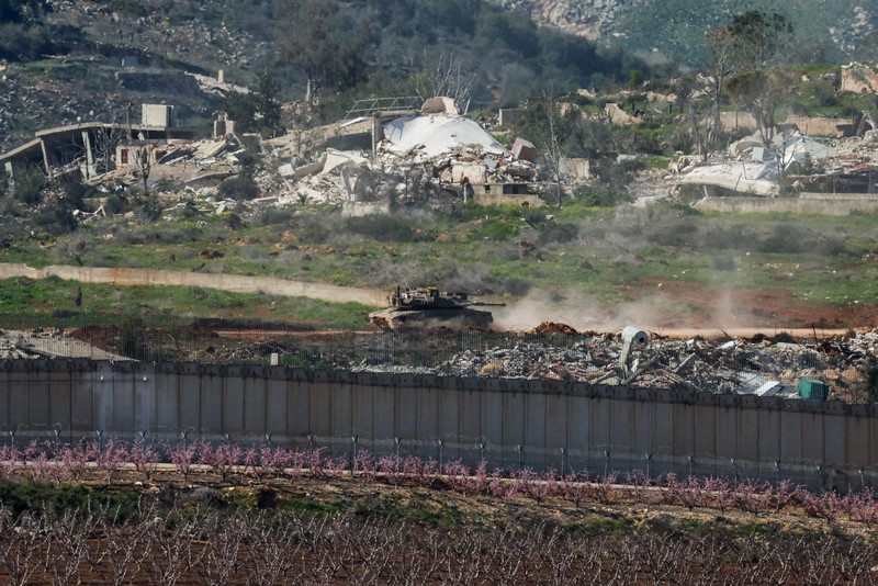 An Israeli tank manouvers in Lebanon, following an escalation between Hezbollah and Israel amid the U.S.-Israeli conflict with Iran, as seen from the Israeli side of the border with Lebanon, March 5, 2026. REUTERS/Ammar Awad