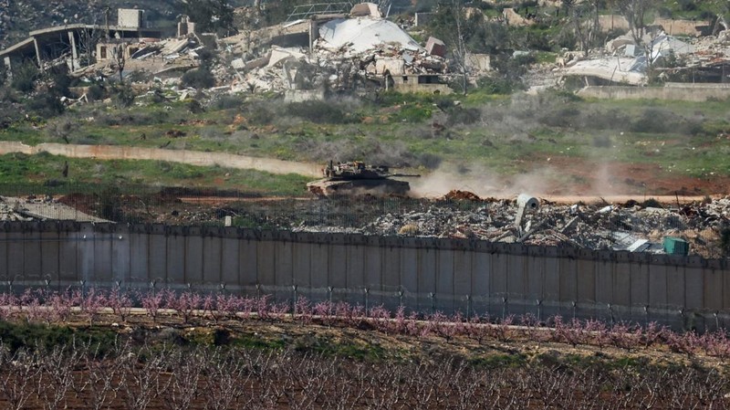 An Israeli tank manouvers in Lebanon, following an escalation between Hezbollah and Israel amid the U.S.-Israeli conflict with Iran, as seen from the Israeli side of the border with Lebanon, March 5, 2026. REUTERS/Ammar Awad
