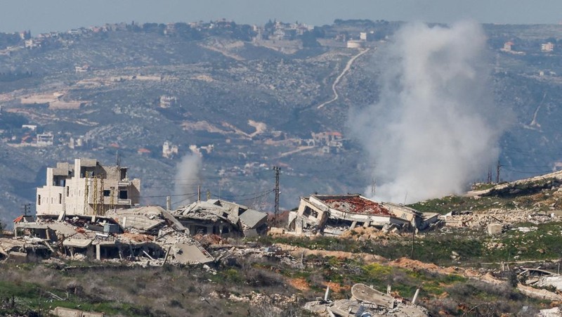 An Israeli tank manouvers in Lebanon, following an escalation between Hezbollah and Israel amid the U.S.-Israeli conflict with Iran, as seen from the Israeli side of the border with Lebanon, March 5, 2026. REUTERS/Ammar Awad