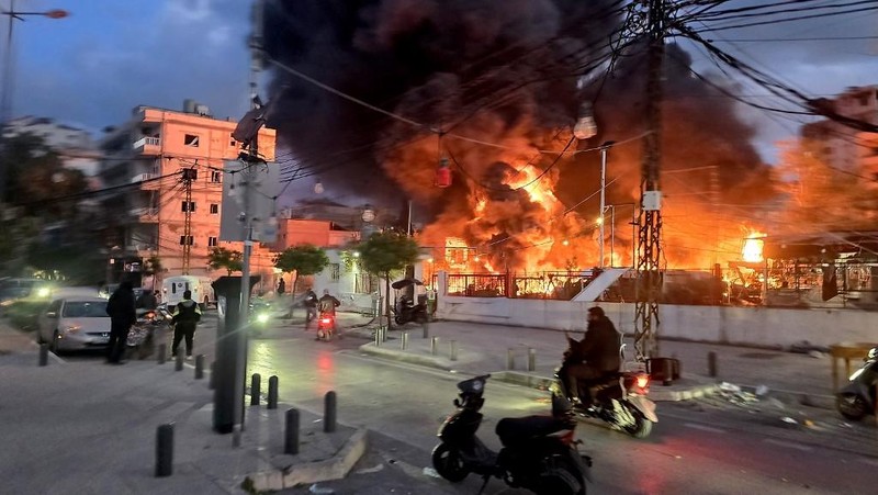 An Israeli tank manouvers in Lebanon, following an escalation between Hezbollah and Israel amid the U.S.-Israeli conflict with Iran, as seen from the Israeli side of the border with Lebanon, March 5, 2026. REUTERS/Ammar Awad