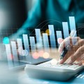 Businesswoman use laptop and calculator analyzing company growth, future business growth arrow graph, development to achieve goals, business outlook, financial data for long term investment.